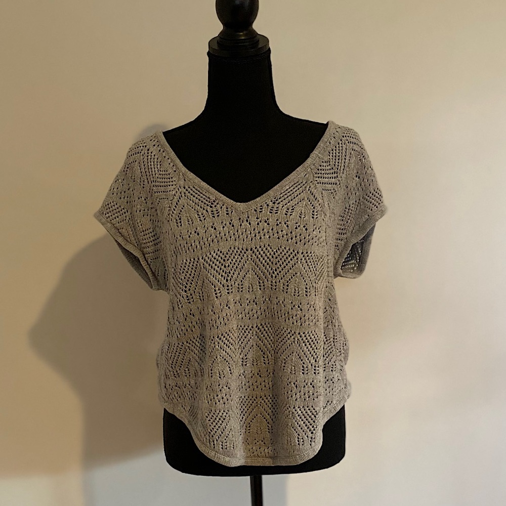 Cotton Crochet Medium Top with petal sleeves.